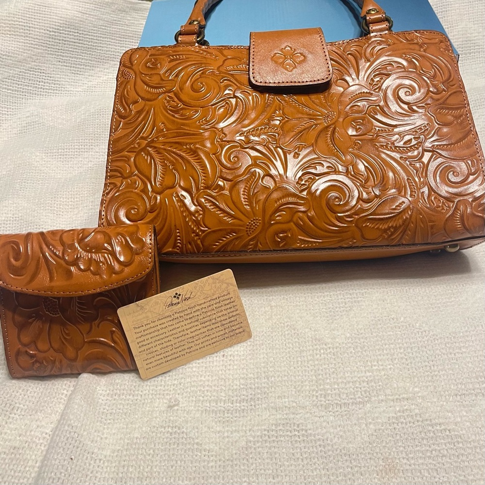 Just like new Patricia Nash handbag and matching wallet.
